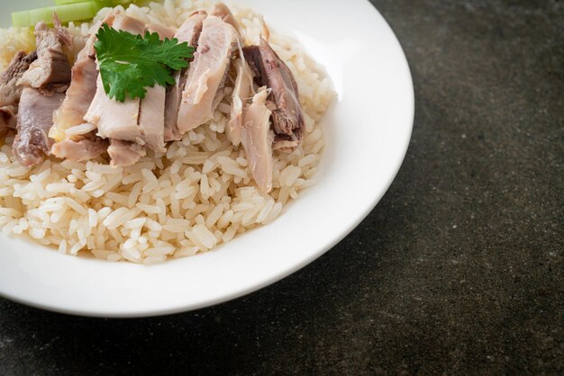 Hainanese Chicken Rice or steamed rice with chicken - Asian food style