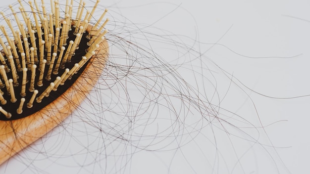 Hair loss stick to combhair loss serious problems and hair loss
on a white background