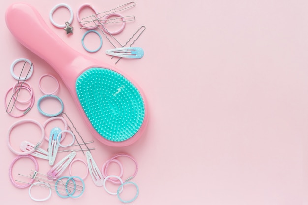 Hair scrunchies and hairpins, hairbrush, beauty concept. flat lay. free space for text