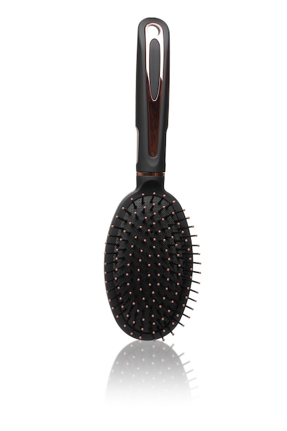 Hairbrush isolated on white background Black and gold hair brush cut out Design element Personal grooming accessory