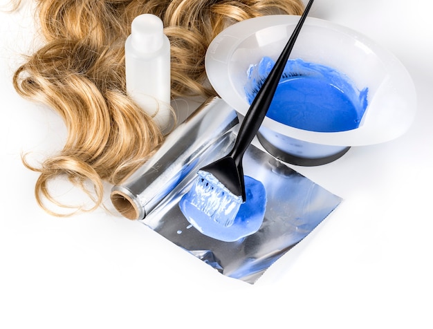 Photo hairdresser accessories for coloring hair on white