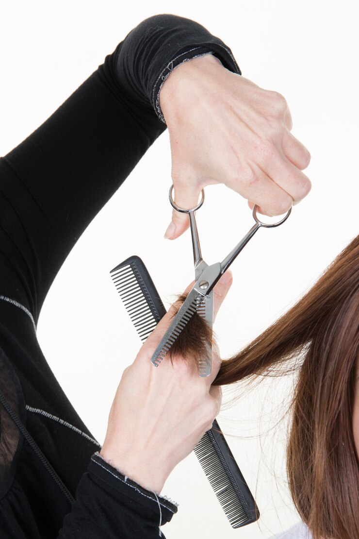 hairdresser doing haircut