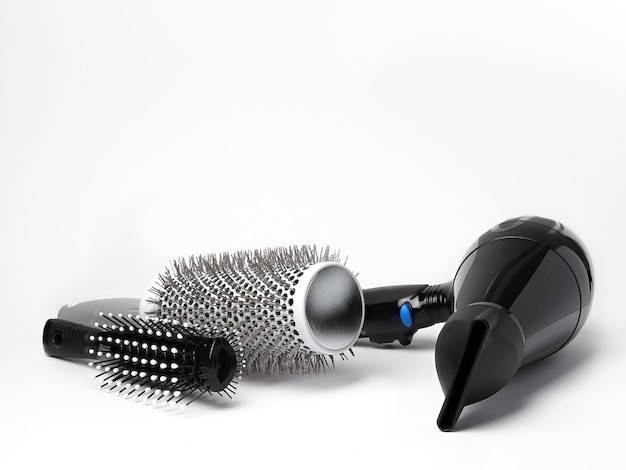 Hairdresser tools in beauty salon on white background