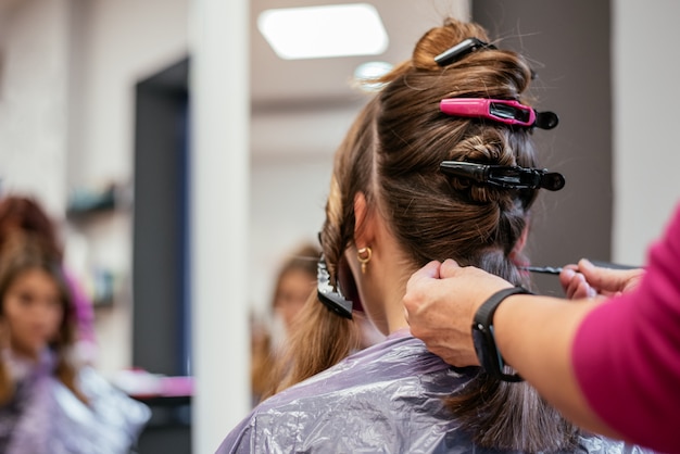 Hairdresser with woman client