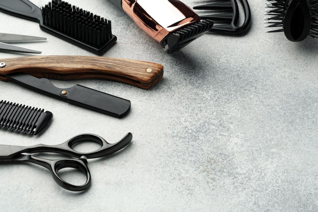 Hairdressing tools set on light gray background