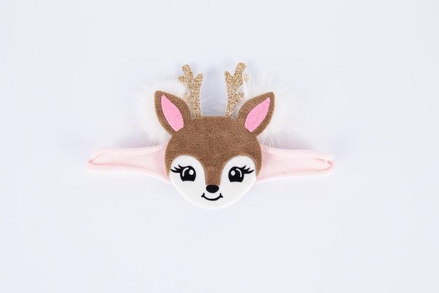 Photo a hairpin bow decoration for a girl with a face of a small deer