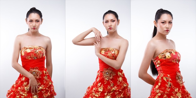 Half Body Portrait of 20s Asian Woman long straight black hair wear Red Gold Traditional Chinese Costume cosplay. Girl poses over white Background isolated