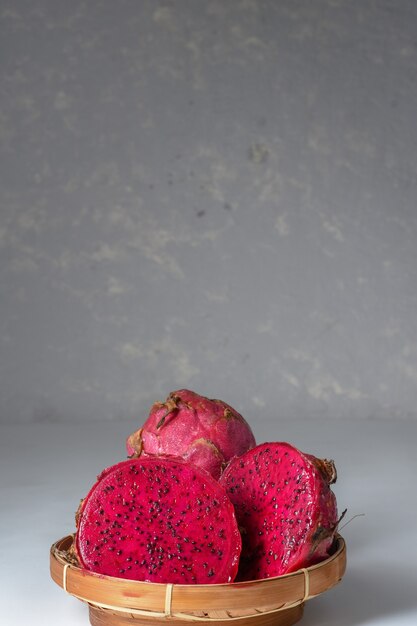 Half cut and whole fresh dragon fruit