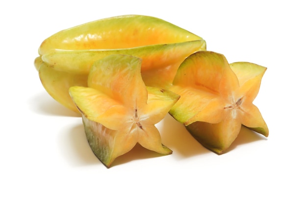 Half cut and whole fresh organic star fruit delicious isolated on white background clipping path