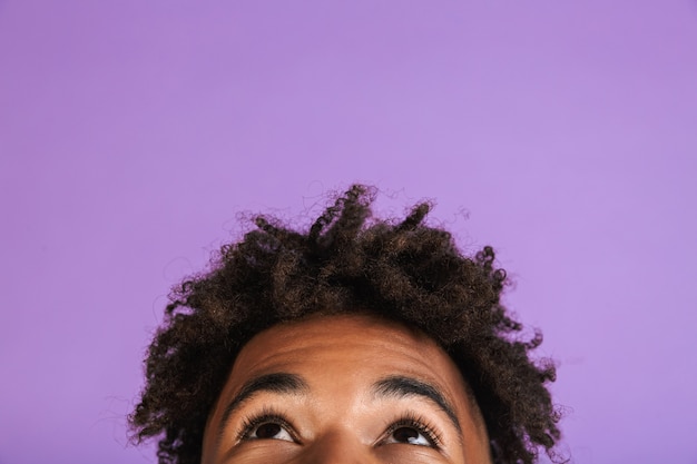 Half face portrait of a cherful young afro american man