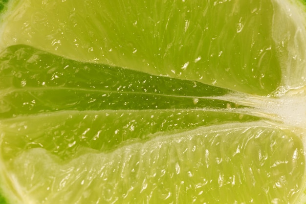 Half of fleshy lime. Texture, macro, fruit, concept