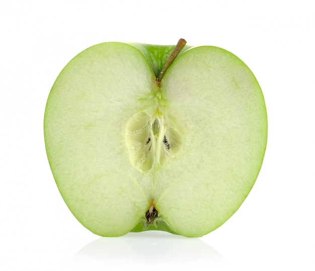 Half green apple on white