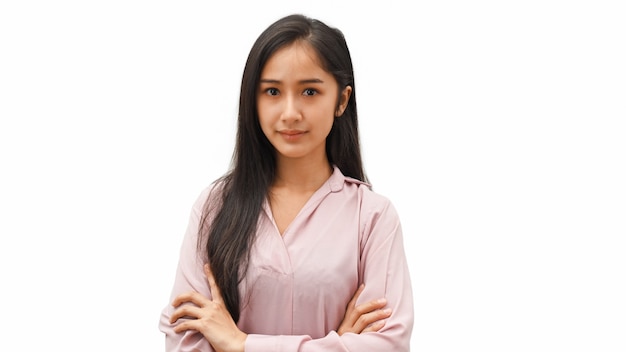 Half-length portrait of young female arm crossed standing isolated in white background