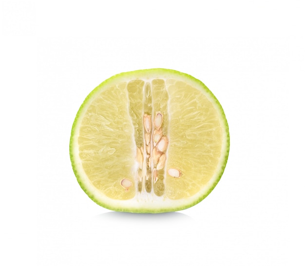 Half of lime citrus fruit (lime cut) isolated.