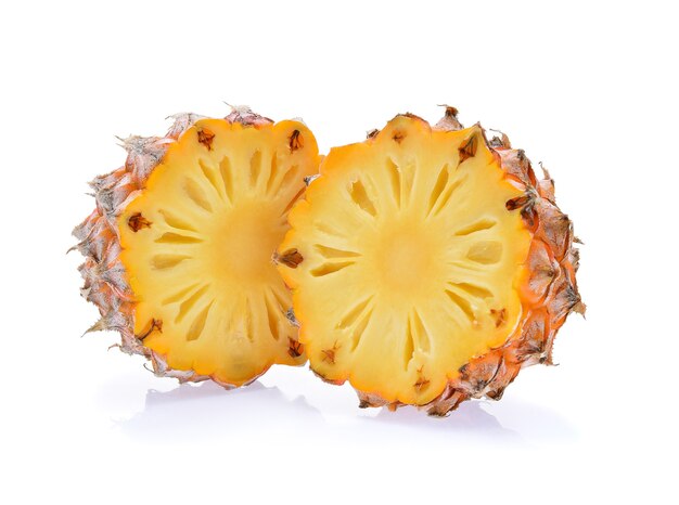 Half of pineapple isolated on white