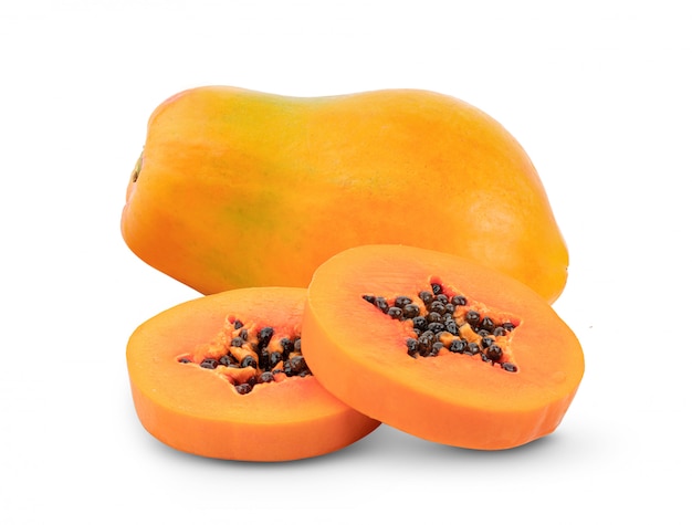 Half of ripe papaya fruit with seeds isolated on white
