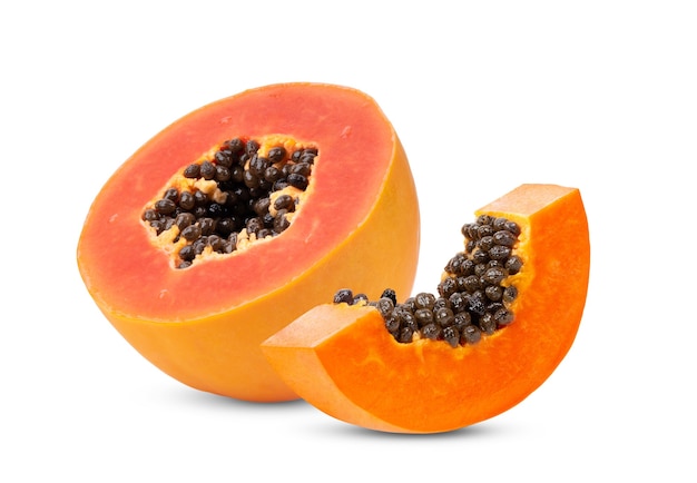 Half  ripe papaya fruit with seeds isolated on white