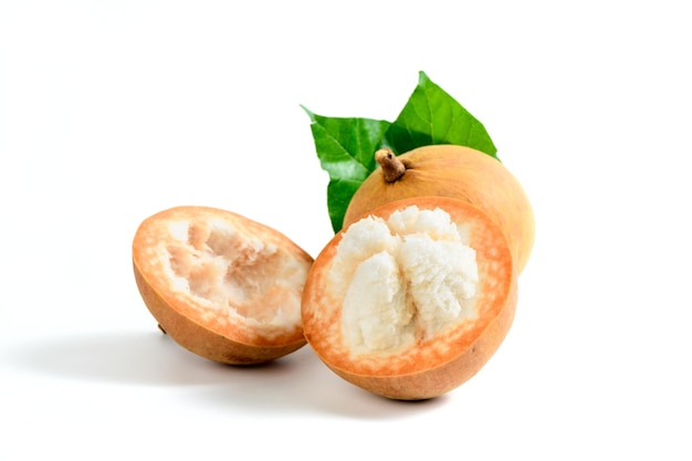 Photo half santol isolated pn white background santol has sour taste