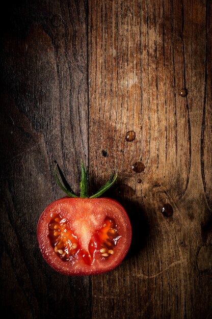 half tomato on wood