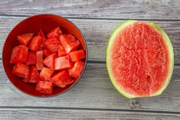 Half Watermelon and chunks of watermelon ready to eat