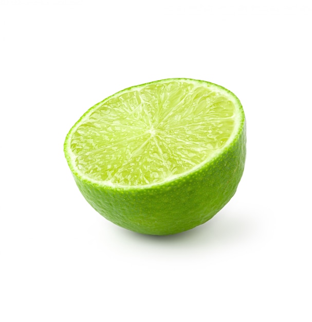 Half with slice of fresh green lime isolated on white background