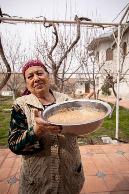 halisa in hand of old woman