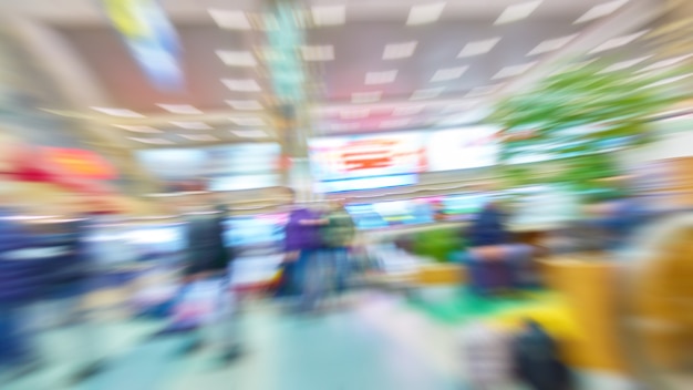 Hall of an airport in motion blur - defocused blurred background