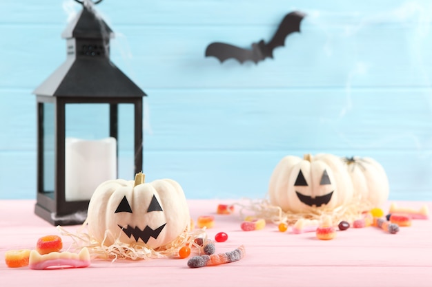 Halloween background with gingerbread and other sweets with place for text