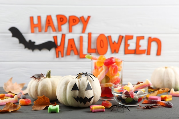 Halloween background with gingerbread and other sweets with place for text