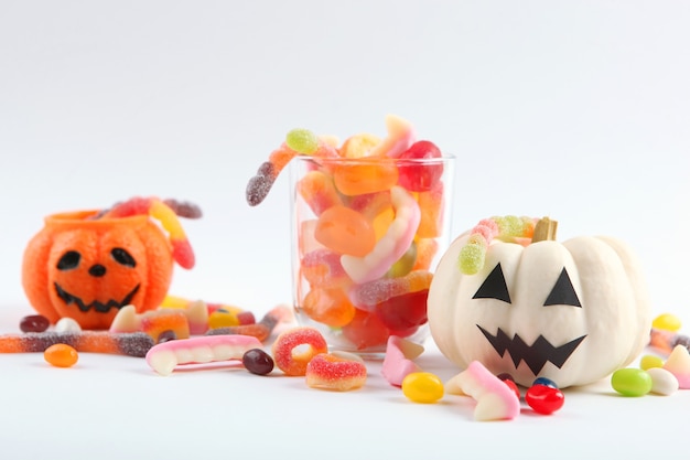 Halloween background with gingerbread and other sweets with place for text