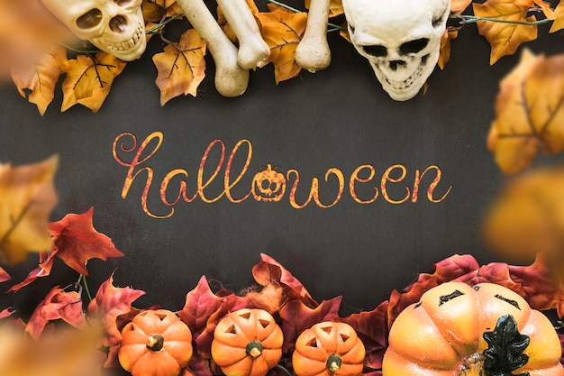 Foto halloween-banner met schedels en pompoenen