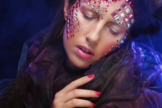 Photo halloween beauty style woman makeup, fantasy dream.