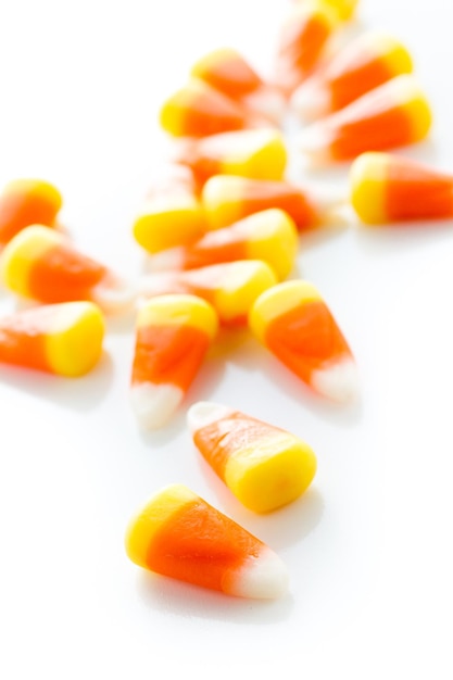 Halloween candy-corn on a white background.