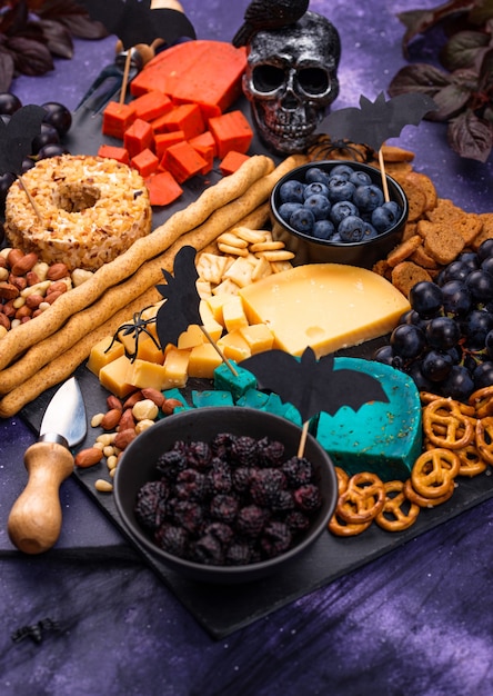 Halloween cheeseboard with blue and red cheese