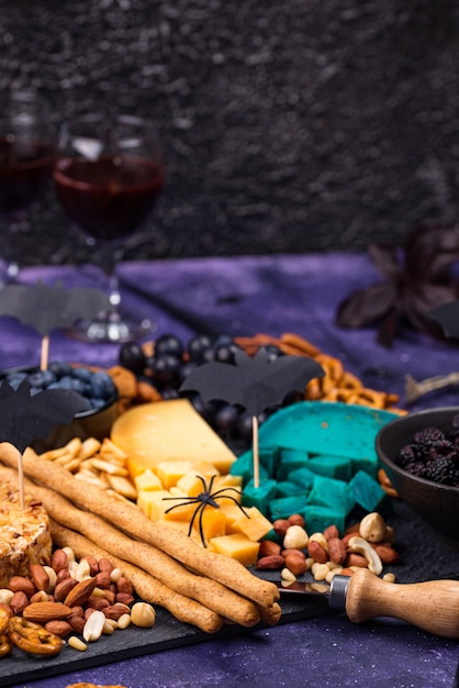 Halloween cheeseboard with blue and red cheese