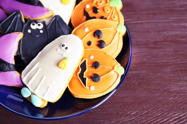 Halloween cookies on black plate