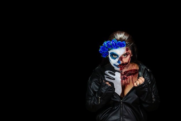 Halloween costume and makeup Portrait of Calavera Catrina Zombie Portrait of a woman