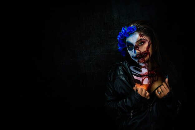 Halloween costume and makeup Portrait of Calavera Catrina Zombie Portrait of a woman