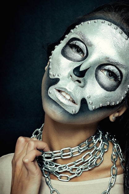 halloween and creative make-up theme beautiful girl model with black body 