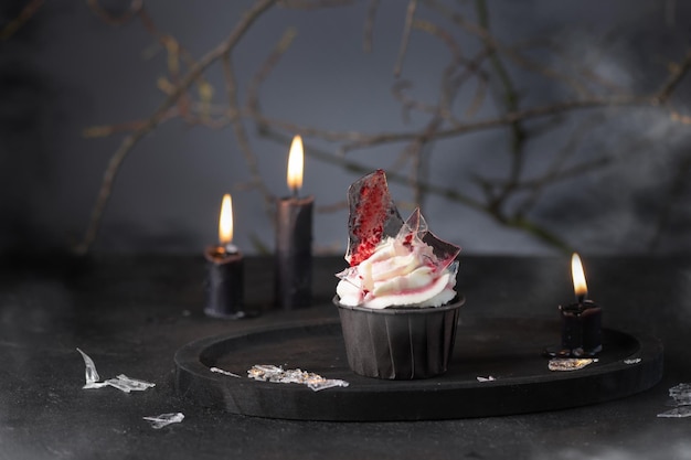 Halloween cupcake with buttercream artificial glass and blood