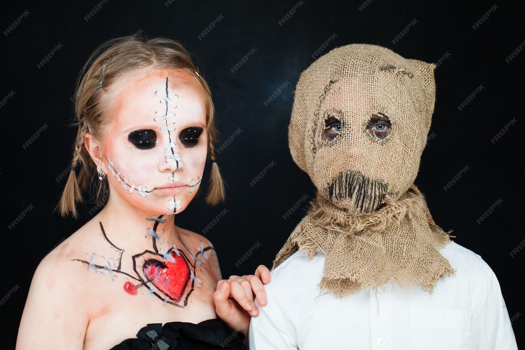 Premium Photo | Halloween dead doll and jackstraw young boy and girl with  halloween makeup