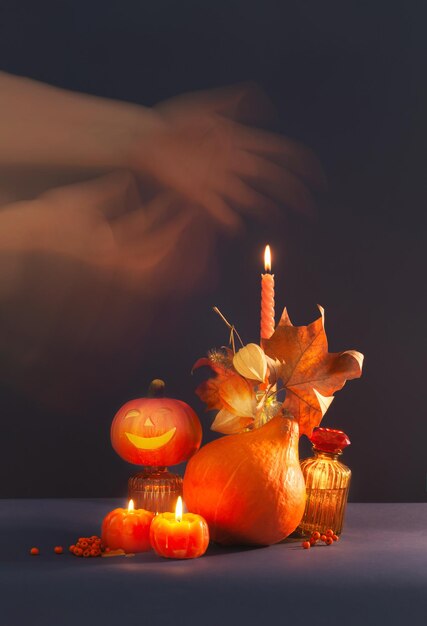 halloween decor with pumpkins on dark blue background