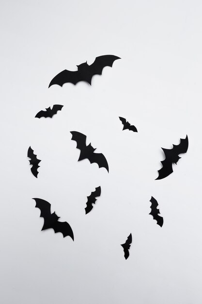 Photo halloween and decoration concept - paper bats flying