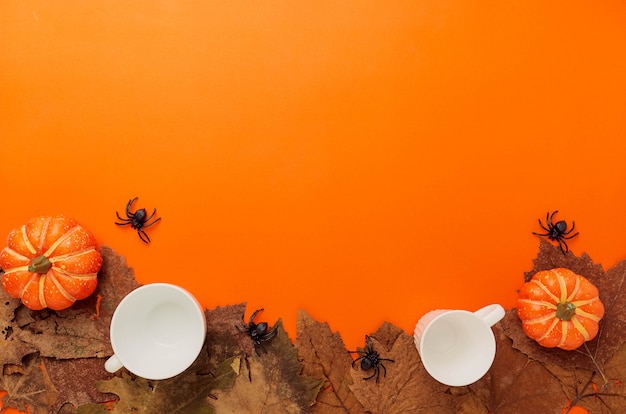 Photo halloween decoration with pumpkins and foliage