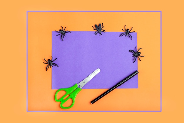 Halloween DIY and kids creativity. Prerpration tools: toilet roll tube, scissors, colored paper for making decoration monster. Children Craft Eco-friendly reuse recycle.