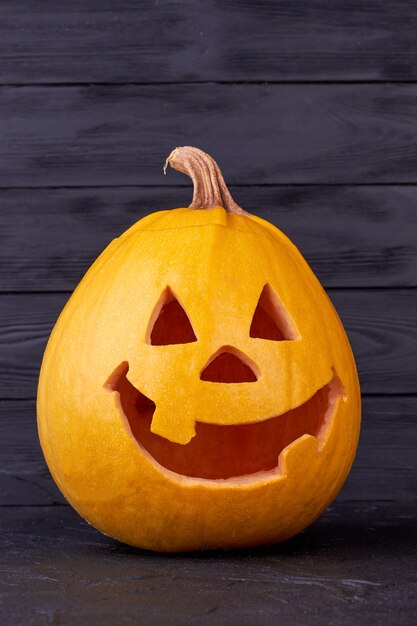 Halloween festive pumpkin on dark background.