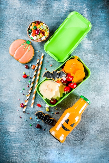 Halloween food, school lunch box with pumpkin drink bottle