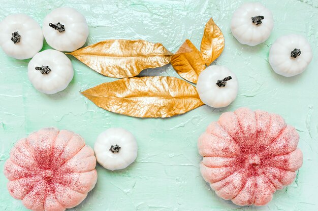  Halloween glitter pink, white pumpkins and gold leaves on mint background