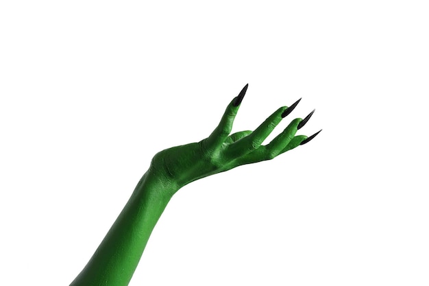 Foto colore verde di halloween della mano del mostro delle streghe o di zombie isolata su fondo bianco