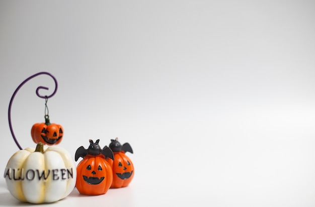 Halloween holiday pumpkins and others on white background